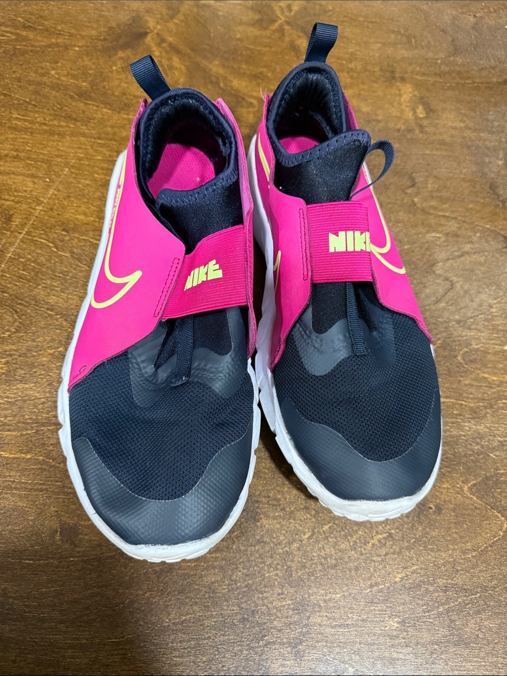 Nike Kids Pink and Black Slip-On Sneakers with Yellow Swoosh
